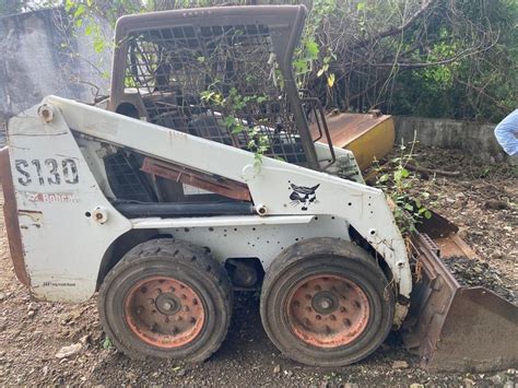 bobcat skid steer tipping load|bobcat s130 weight weight.